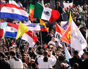 Pope Francis is greeted in St. Peter's Square by flags from every inhabited continent: Australia, Indonesia, Sweden, the United States, the People’s Republic of China, as well as countless blue-and-white banners from his native Argentina.
