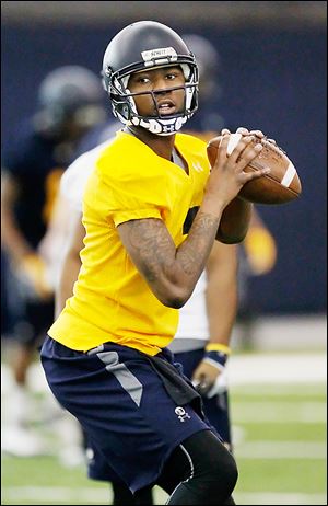 UT quarterback Terrance Owens said he played the final month of the season with two high ankle sprains. Owens threw for only one touchdown in his final three appearances before missing the Famous Idaho Potato Bowl.
