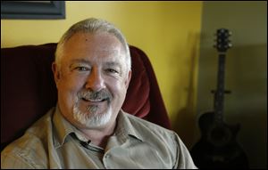 Jonathan Standridge, poses for a photo at his home in SeaTac, Wash., Monday, March 18, 2013. Standridge is serving as a mentor to Colton Harris-Moore, who is also known as the 