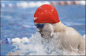 Jack Barone of St. Francis competes at the district meet at BGSU. Barone was state runner-up in the 100-yard breaststroke and helped the 200 medley relay place second.