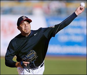 Mud Hens pitcher Jose Alvarez throws during practice at Fifth Third Field. Toledo opened the season on the road and plays at home Thursday.