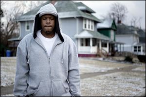 Anthony Moore II — who is not related to Mitchell Moore — said it took him 23 years to learn the truth about his father, a man he never met. ‘Honestly. Upbringing and everything was good, but no father. So I’m out here with the fellas. We all want to be cool,’ says Moore, a member of the Lawrence Blood Villains.