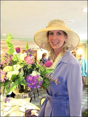 Judy Miller at the Toledo Club's tea party.