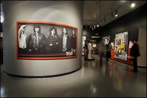A large photo of the Rolling Stones dominates an exhibit space at the Rock and Roll Hall of Fame in Cleveland. The new exhibit 