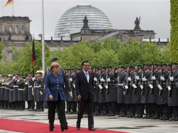 German Chancellor Merkel vows to lobby E.U. to avoid trade spat with ...