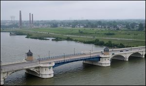 The Martin Luther King, Jr., Bridge spans the Mau-mee River just south of the site of the proposed Marina District in East Toledo. 