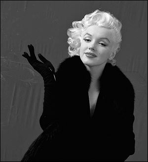 This 1955 portrait of actress Marilyn Monroe by fashion and celebrity photographer Milton H. Greene is part of 3,700 never-before published negatives and transparencies that are going on the auction block. 