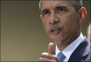 President Obama makes a statement about the crisis in Syria in the Rose Garden of the White House in Washington, Saturday.