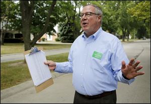 Toledo Mayoral  Candidate D. Michael Collins while campaigning in Ragan Woods.