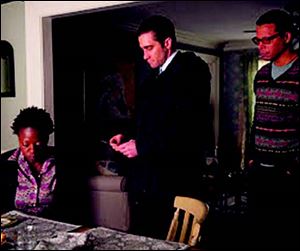 Gyllenhaal in a scene with Viola Davis and Terrence Howard in ‘Prisoners.’