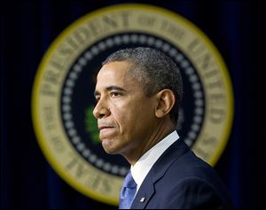 President Obama pauses as he speaks at the White House last week. He faces a budget showdown with Congress.