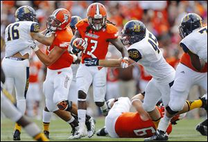 Bowling Green's Travis Greene (13) had 133 yards rushing against Murray State. The Falcons’  sophomore running back is second in the MAC in yards rushing per game.