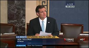 Senator Ted Cruz continues to speak on the floor of the U.S. Senate at 5:21 a.m. EDT  as seen on a C-SPAN broadcast.