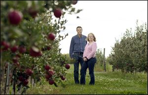Cornell University research specialist, Kevin Maloney, left, and apple breeding program leader, Dr. Susan Brown.