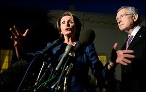 House Minority Leader Rep. Nancy Pelosi, D-Calif., left, with Senate Majority Leader Sen. Harry Reid, D-Nev., speaks to reporters following a meeting with President Barack Obama and the Republican leadership at the White House tonight.