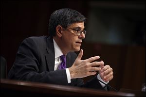 Treasury Secretary Jacob Lew testifies on Capitol Hill in Washington before the Senate Finance Committee to urge Congress to reopen the government and lift the U.S. borrowing cap.