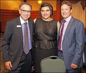 From left, board member Larry Boyer, student journalism awardee Danielle Gamble, and guest speaker Jim Tankersley at the Press Club awards night.