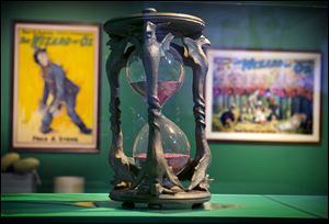 The hourglass from the movie ‘The Wizard of Oz’ is displayed at the Farnsworth Art Museum in Rockland, Maine, as part of a 107-piece exhibit of props from movies, early books, posters, and an array of memorabilia from the pop culture sensation.