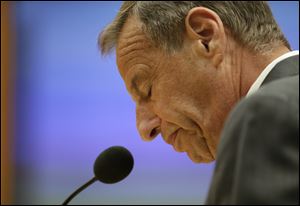 Former San Diego Mayor Bob Filner, shown here at his resignation announcement, now faces criminal charges involving women.
