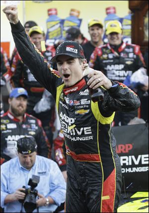 Jeff Gordon celebrates winning the NASCAR Sprint Cup  race Sunday in Martinsville, Va.