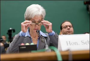 Health and Human Services Secretary Kathleen Sebelius prepares to testify on Capitol Hill in Washington, today, before the House Energy and Commerce Committee hearing on the difficulties plaguing the implementation of the Affordable Care Act.