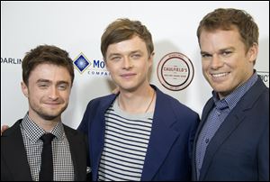Daniel Radcliffe, Dane DeHaan, and Michael C. Hall arrive at the premiere of 'Kill Your Darlings' Oct. 3 at the Writers Guild Theater in Beverly Hills, Calif.