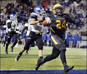 Toledo's Damion Jones-Moore scores a touchdown against Buffalo during the first quarter Tuesday.