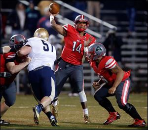 Central Catholic quarterback DeShone Kizer (14) throws the ball against Tiffin Columbian.