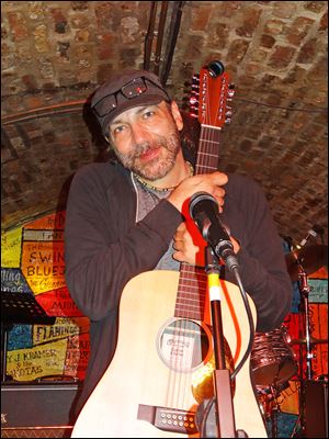 Toledo musician Mark Mikel will celebrate 35 years of music with a concert Saturday night at the Maumee Indoor Theater, 601 Conant St. Doors open at 7:15 p.m. for the show that will include fellow artists such as Jeff Kollman, Bill Hubauer, Ian McCormack, Zak Freed, and Brad Babcock. The concert will feature music from throughout Mikel's career, including his work with the Pillbugs. He recently returned from an acoustic tour of the United Kingdom, and will be selling CDs of his music, including his box set 