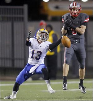 Central’s Ryan O'Hearn, right, breaks up a pass intended for Clyde’s Blake Miller. Clyde advances to the state semifinals.