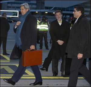 U.S. Secretary of State John Kerry arrives at Geneva International airport in Switzerland today for the Iran nuclear talks.