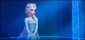 This image released by Disney shows a teenage Elsa the Snow Queen, voiced by Maia Mitchell, in a scene from the animated feature 