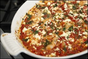 Shrimp with feta and tomatoes.