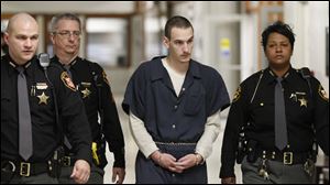 Steven King, II arrives for his hearing in Lucas County Common Pleas Court in Toledo, Tuesday.