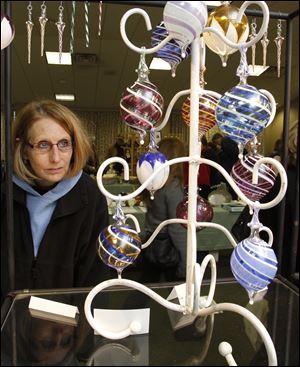 Hand-blown glass ornaments are typical of the arts and crafts that will be available at  Heralding the Holiday events at Toledo Botanical Garden this weekend.