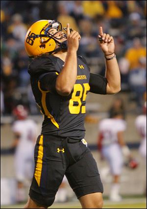 University of Toledo kicker Jeremiah Detmer (85) points to the sky after kicking his first field goal against  Eastern Washington University in September. 
