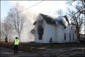 Toledo crews respond to a blaze at a vacant house at Elmore and Church streets in East Toledo.