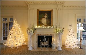 The painting, Miss Derby, over the fireplace at the Manor House at Wildwood Metropark Preserve.