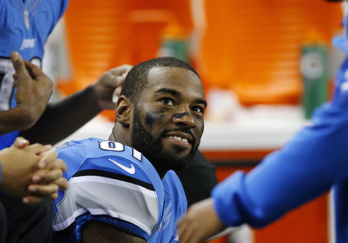 Lions' Calvin Johnson transforming lives of young men with foundation,  family at side
