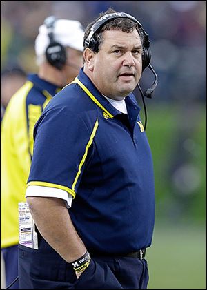 Michigan coach Brady Hoke and his peers have hit the road this month to build relationships with potential players.