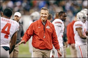 Ohio State coach Urban Meyer reportedly said he had no interest in the Texas job. Yet, outside interest could force OSU to boost Meyer’s salary higher than the $4.3 million he currently makes.