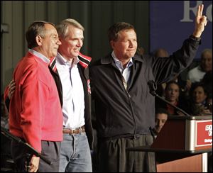 U.S. Rep. John Boehner, left, U.S. Senator Rob Portman, center, and Ohio Gov. John Kasich face challenges from conservatives within their own party, who pose challenges to the three Republican stars in this political battleground state.