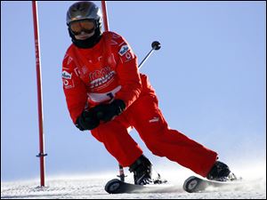 Ferrari driver Michael Schumacher of Germany speeds down a course in Madonna di Campiglio, Italy in January, 2006.