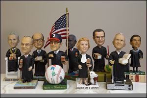 Bobblehead dolls representing Supreme Court Justices, in Washington.