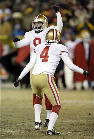 San Francisco 49ers kicker Phil Dawson celebrates after kicking the game-winning field goal on Sunday Green Bay, Wis. The 49ers won 23-20.