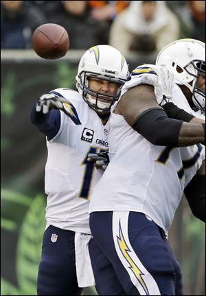 San Diego Chargers quarterback Philip Rivers fires a pass during a win against the Bengals on Sunday in Cincinnati.