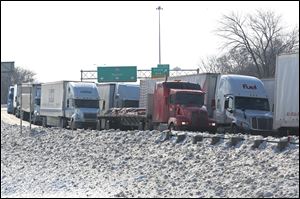 Traffic is stopped on northbound I-75 just south of downtown Toledo shortly after noon today following an incident involving a semi. 