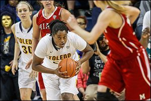 Toledo’s Brianna Jones pulls down a defensive rebound in Sunday’s game. UT travels to Buffalo for a game on Wednesday.