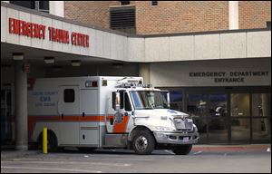 An ambulance at Mercy St. Vincent Medical Center in Toledo is parked after dropping off a patient. Mercy St. Vincent is one of three Level 1 trauma ERs in the city.