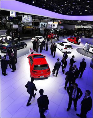  Volkswagens and Kias are on display at the North American International Auto Show in Detroit.